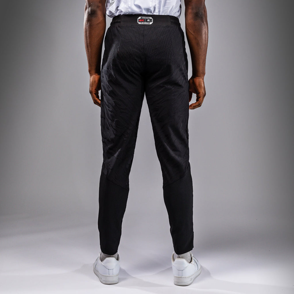 UFC Fusion by Venum Pánské vycházkové kalhoty Authentic Fight Night - Černá