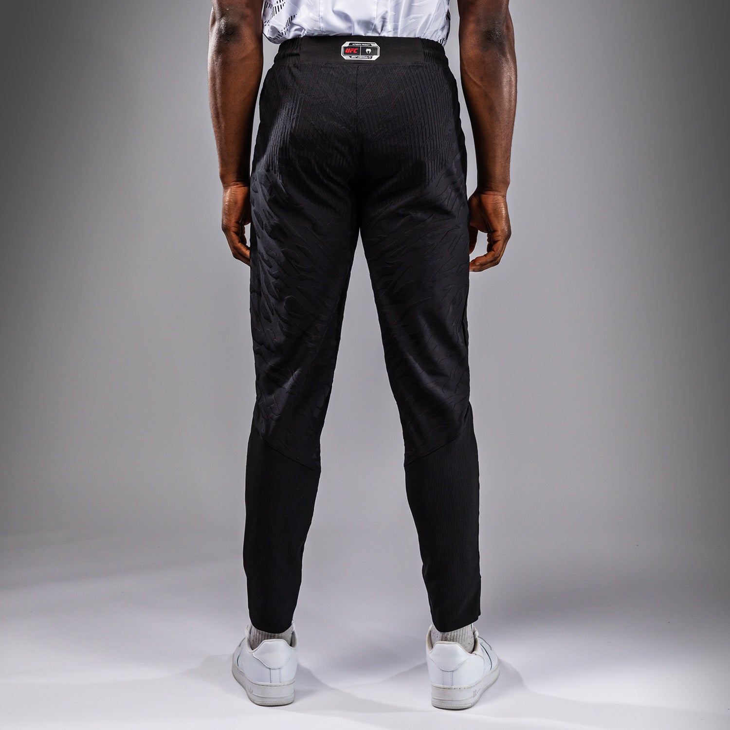 UFC Fusion by Venum Pánské vycházkové kalhoty Authentic Fight Night - Černá