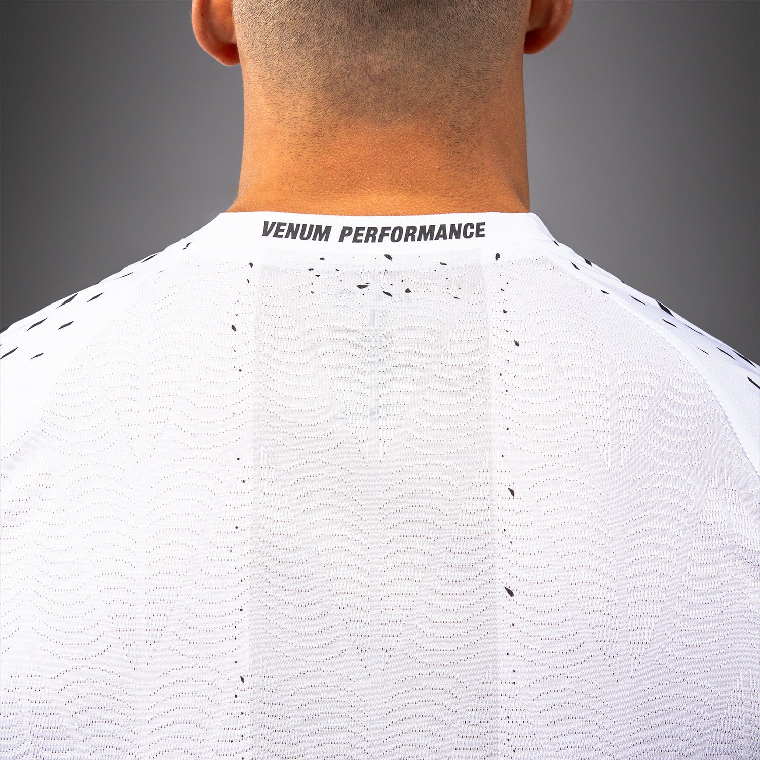 Pánský dres UFC Zenith od Venum Authentic Fight Night Walkout Jersey v bílé barvě