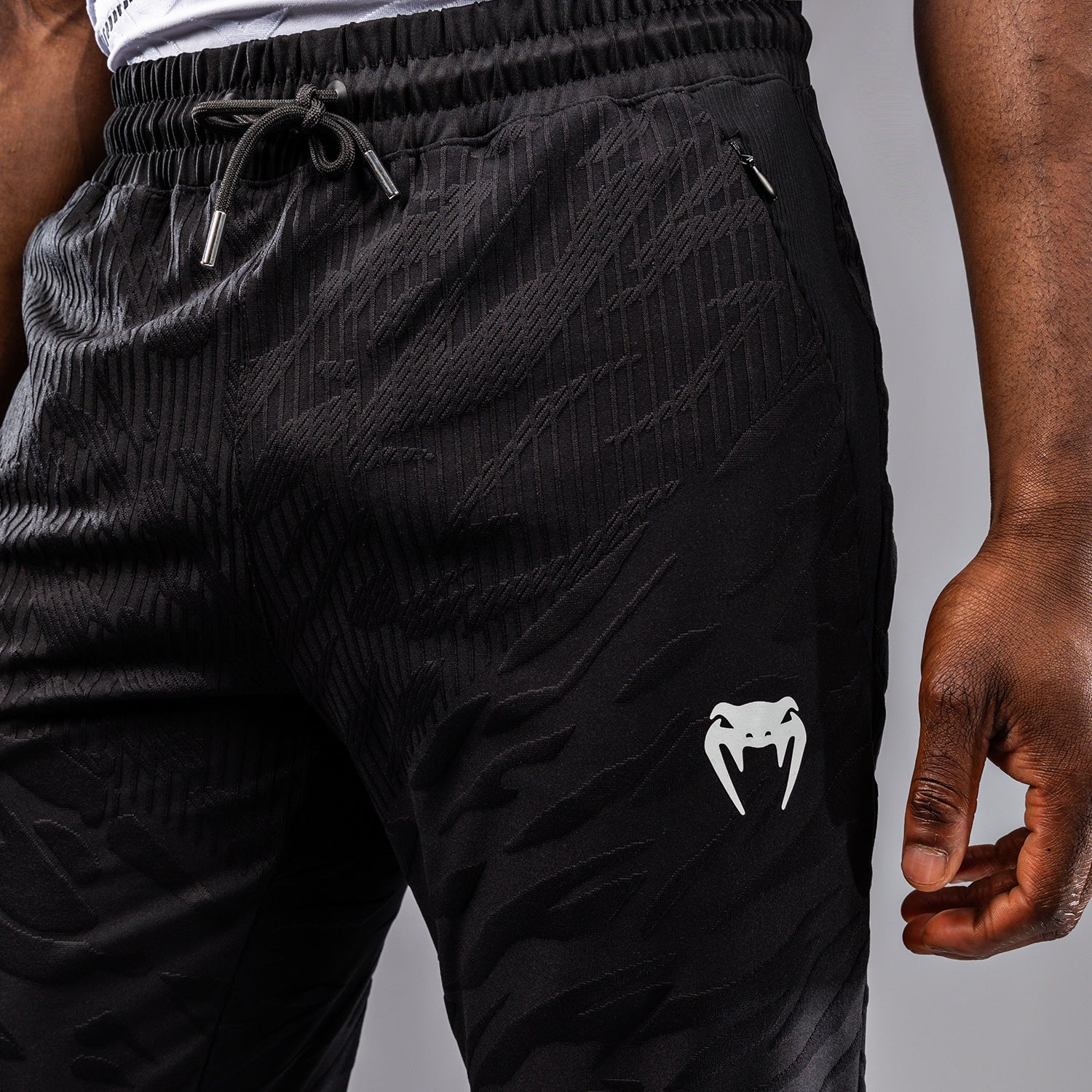 UFC Fusion by Venum Pánské vycházkové kalhoty Authentic Fight Night - Černá