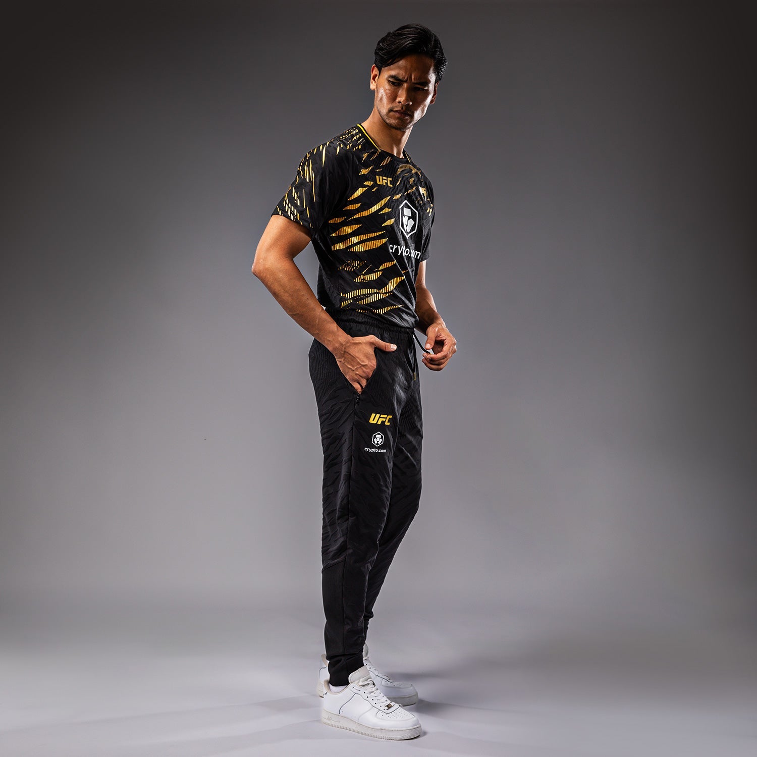 UFC Fusion by Venum Pánské kalhoty Authentic Fight Night Walkout - Champion