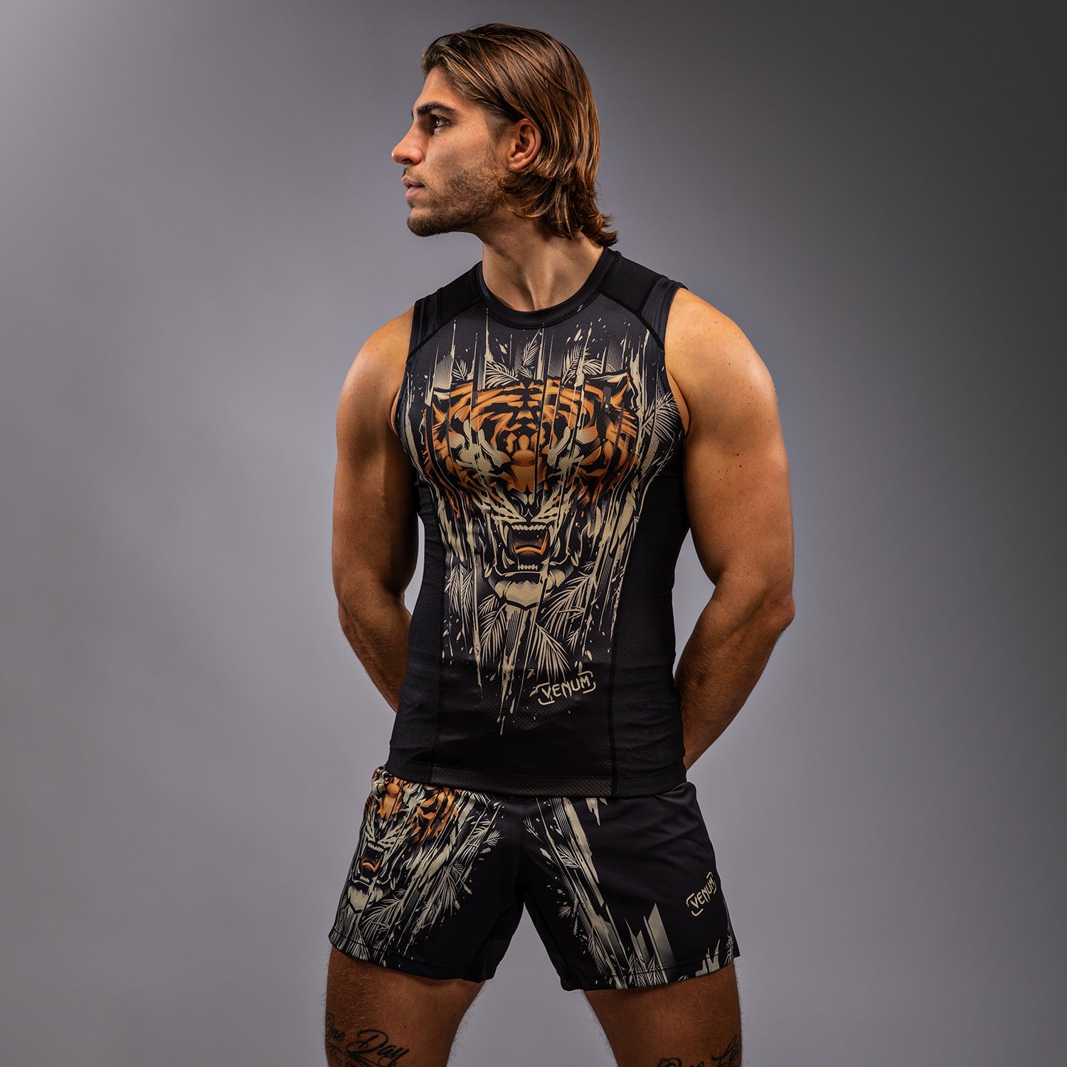 Venum Tiger pánský bezešvý rashguard - černá/neonově oranžová